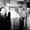Nick and Pete Jenin point to "Dogs to run again", the caption in this 1953 newspaper